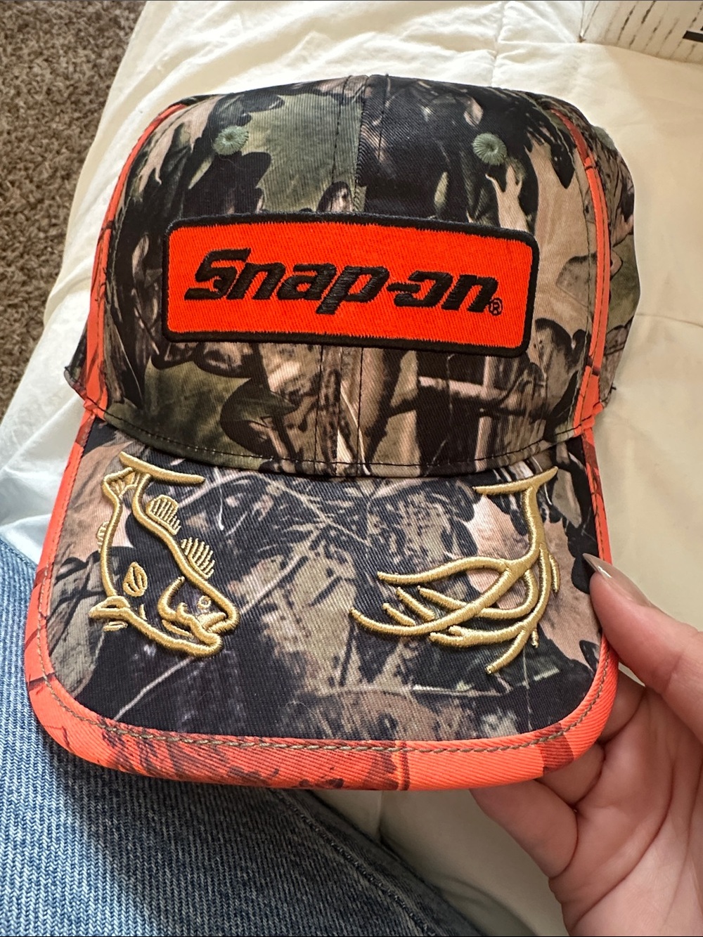 Snap-on Camouflage Orange Trim Trucker Hat
